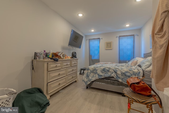 bedroom featuring light hardwood / wood-style floors