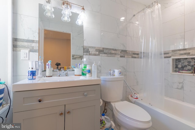 full bathroom featuring vanity, toilet, tile walls, and shower / bath combo