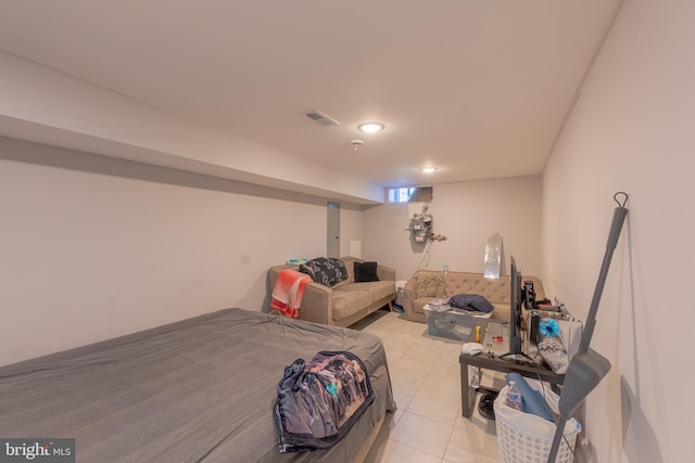 bedroom featuring light tile patterned flooring