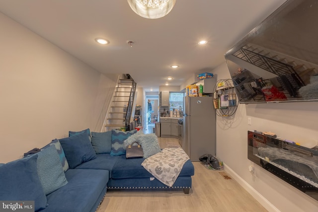 living room with light wood-type flooring