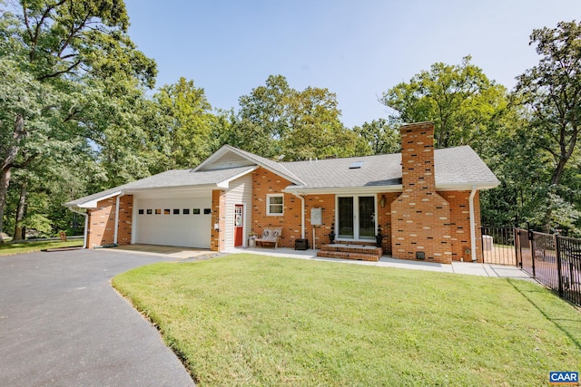 ranch-style house with a garage and a front yard