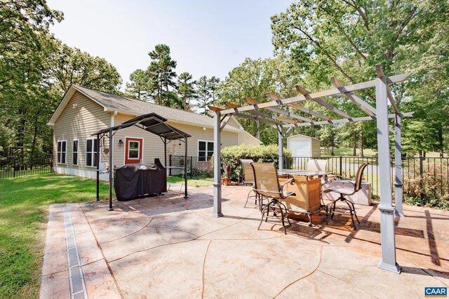 view of patio / terrace featuring grilling area and a pergola