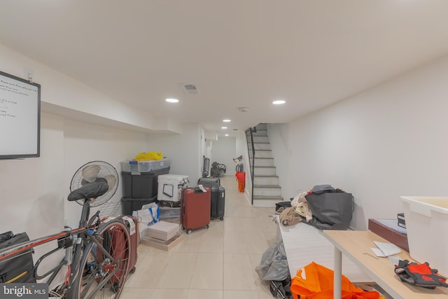 basement with light tile patterned floors