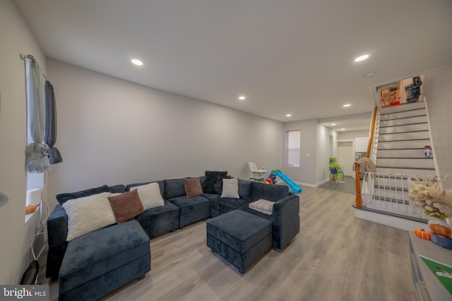 living room with light hardwood / wood-style floors