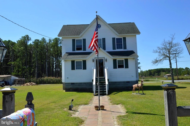 view of front facade featuring a front lawn