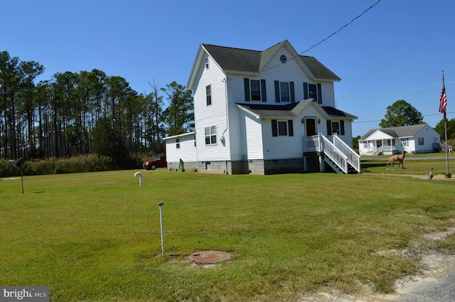 view of front of house with a front yard