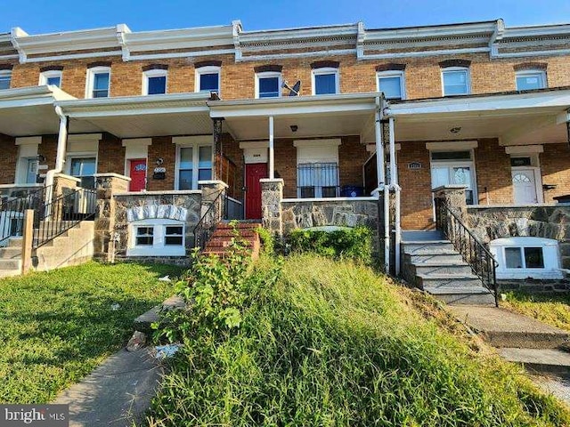 multi unit property featuring covered porch