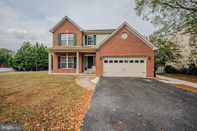 front of property featuring covered porch and a front yard