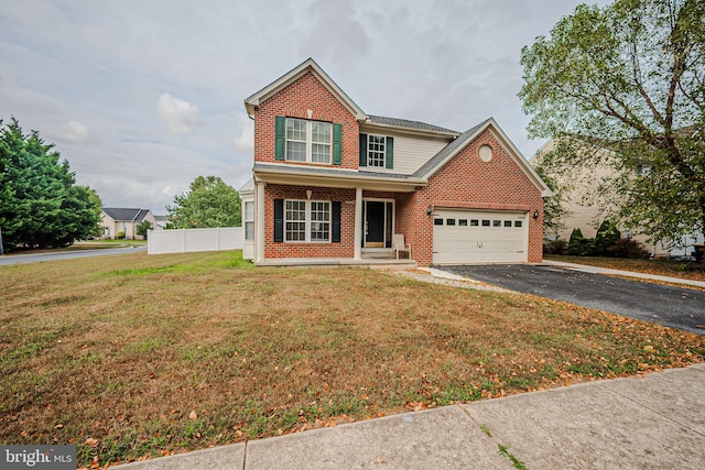 view of front property featuring a front lawn and covered porch