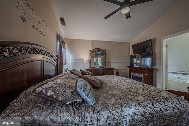 bedroom with high vaulted ceiling, ceiling fan, and ensuite bathroom