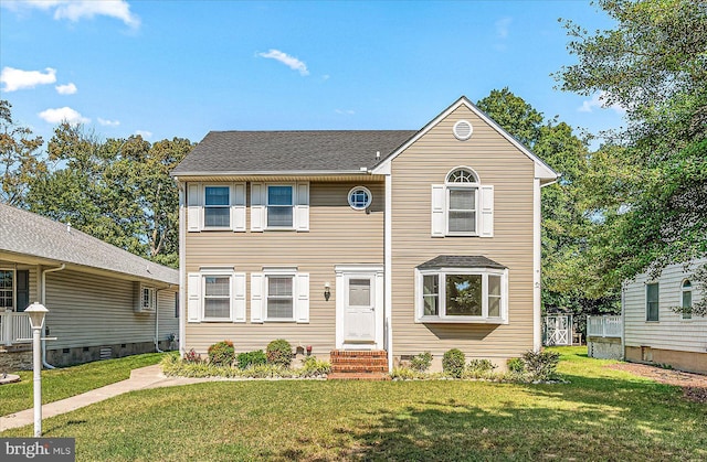 view of front of home featuring a front lawn