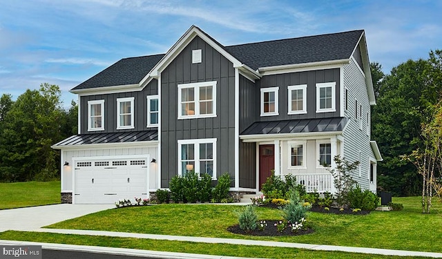 view of front facade featuring a front lawn and a garage