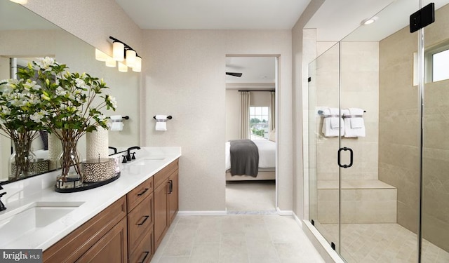 bathroom featuring vanity, walk in shower, and tile patterned floors