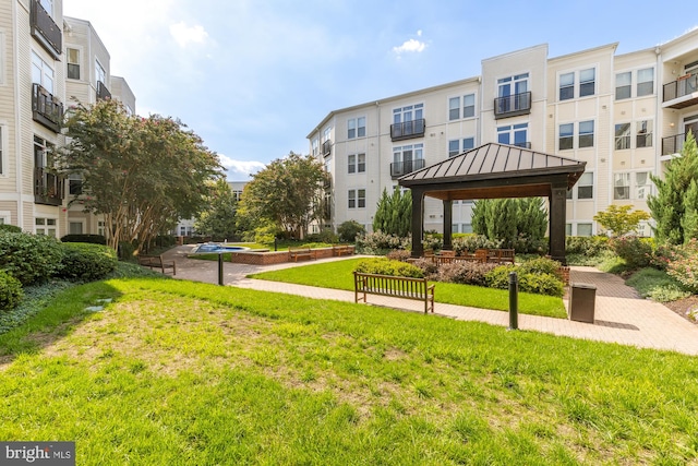 view of community with a gazebo and a lawn