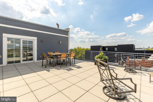 view of patio featuring a balcony