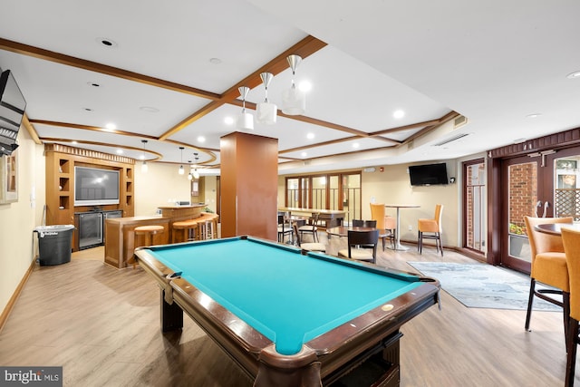 playroom featuring indoor bar, light hardwood / wood-style flooring, and billiards