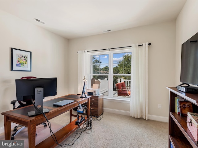 office area with light colored carpet