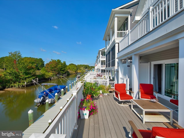 deck featuring a water view