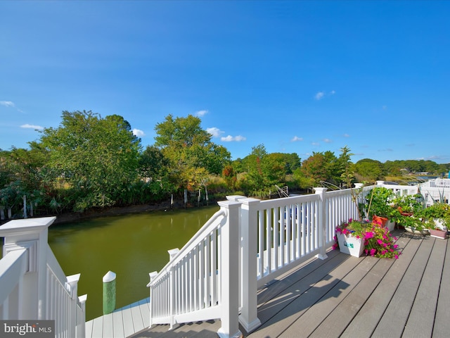 deck featuring a water view