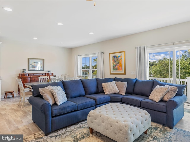 living room with light hardwood / wood-style flooring