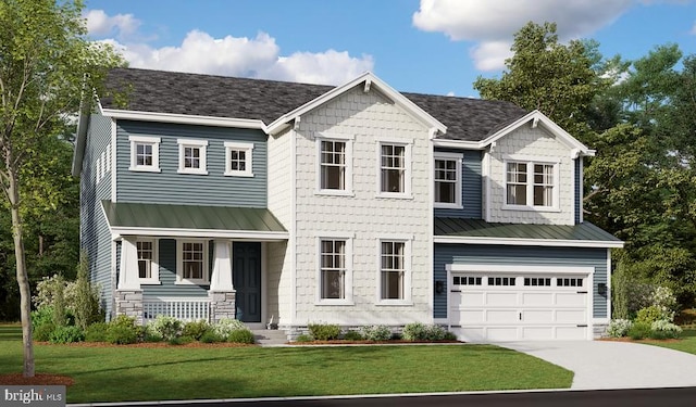 view of front facade with a garage and a front yard