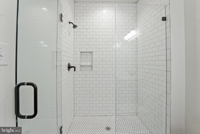 bathroom featuring walk in shower