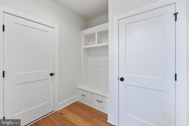 mudroom with light hardwood / wood-style flooring