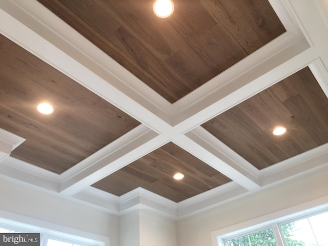 room details with crown molding, wood ceiling, and coffered ceiling