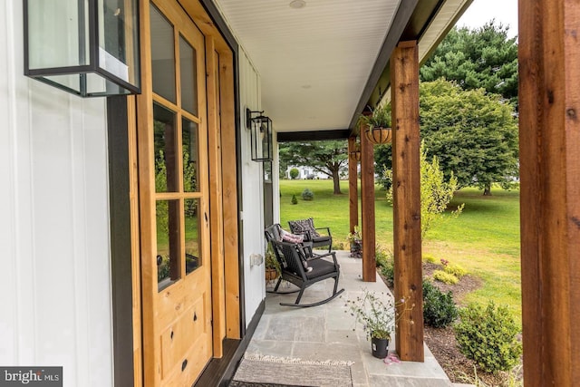 view of patio featuring a porch