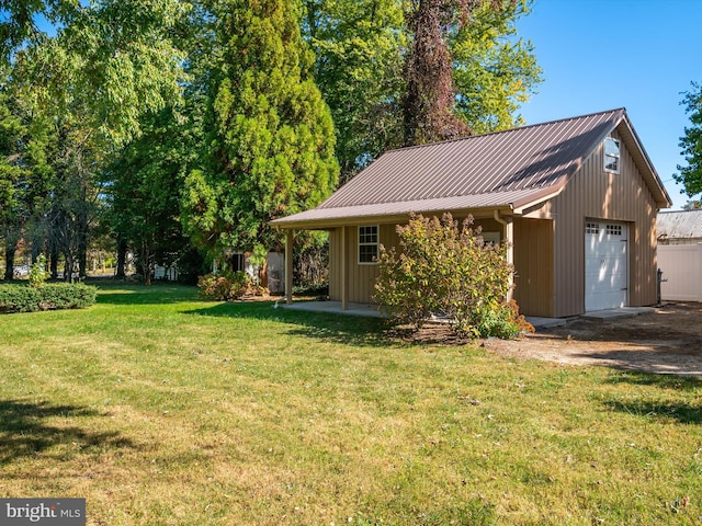 exterior space featuring a garage and an outdoor structure