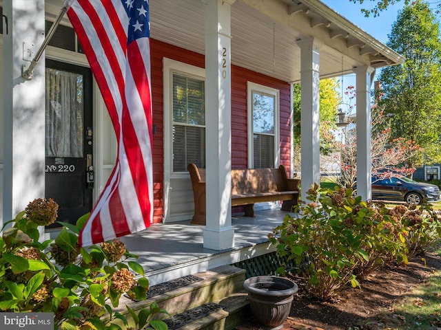 property entrance with a porch