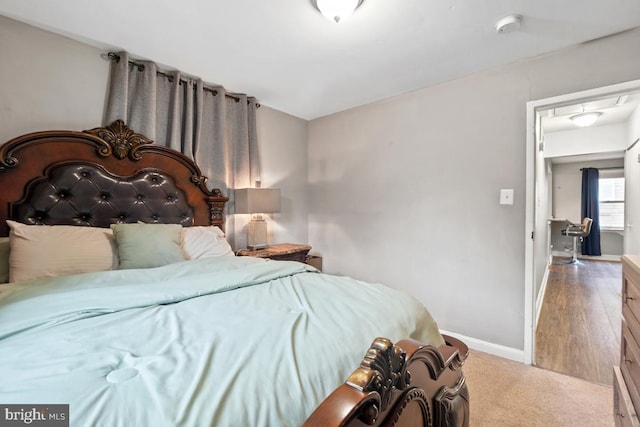 bedroom featuring hardwood / wood-style floors