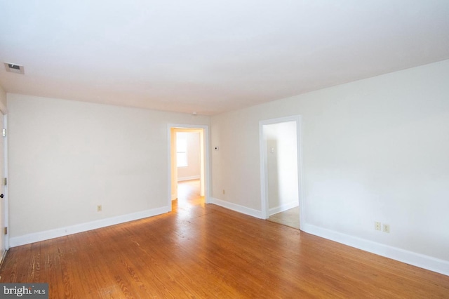 empty room featuring light hardwood / wood-style floors