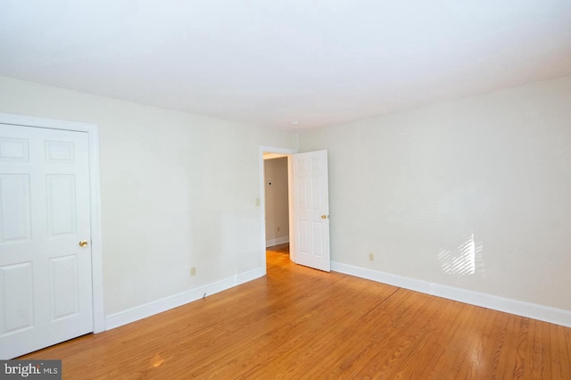 empty room with light wood-type flooring