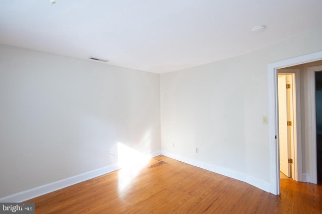 empty room featuring hardwood / wood-style floors