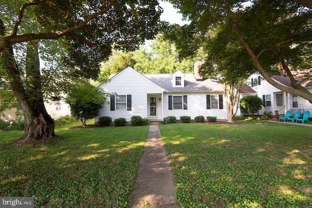 view of front of home with a front yard