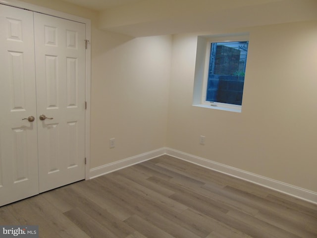 unfurnished room featuring light hardwood / wood-style floors