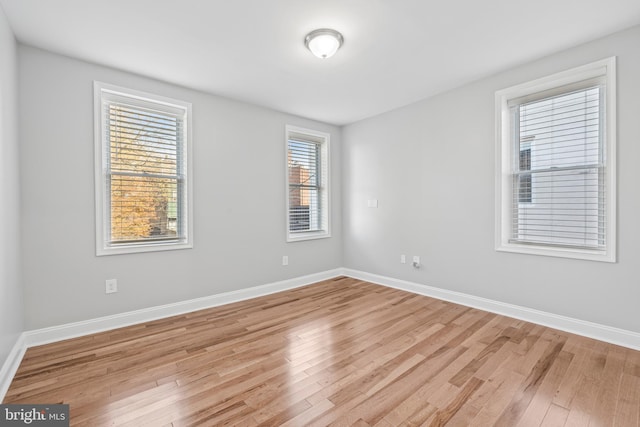 empty room with light wood-type flooring