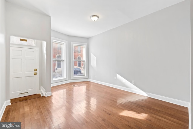 interior space with hardwood / wood-style flooring