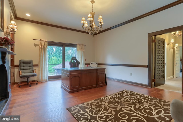 office space with wood-type flooring, ornamental molding, and a chandelier