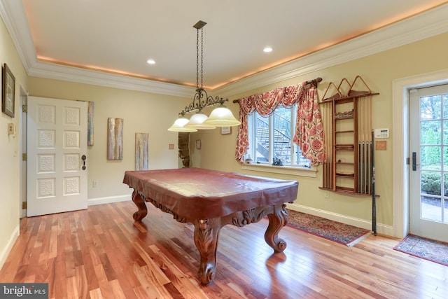 rec room featuring ornamental molding, light wood-type flooring, and billiards