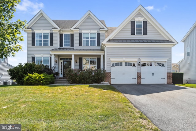 view of front of house featuring a porch and a front lawn