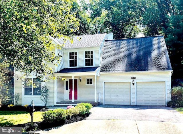 view of front of home with a garage and covered porch