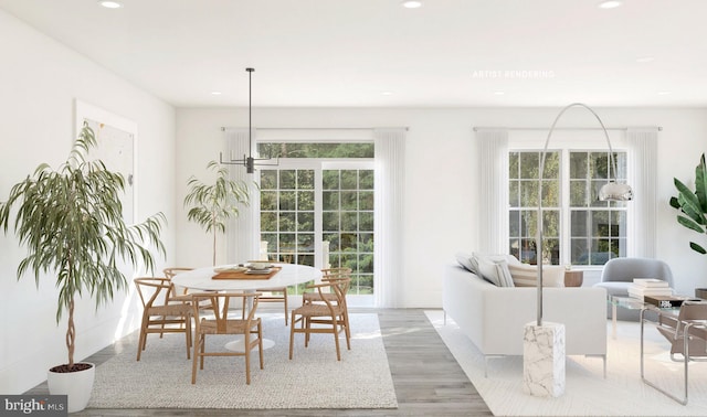 dining area with recessed lighting and light wood-style flooring