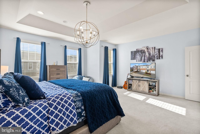 41930 Cushendall Ter, Aldie, VA 20105 - carpeted bedroom featuring a chandelier, a tray ceiling, and baseboards