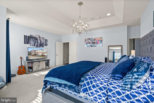 41930 Cushendall Ter, Aldie, VA 20105 - carpeted bedroom with a chandelier and a tray ceiling