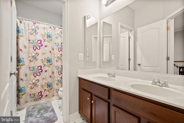 41930 Cushendall Ter, Aldie, VA 20105 - full bath featuring double vanity, toilet, and tile patterned floors