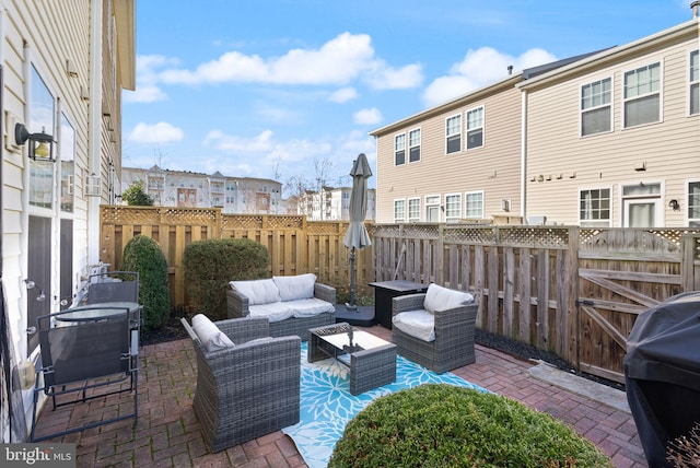 41930 Cushendall Ter, Aldie, VA 20105 - fenced backyard with an outdoor hangout area, a patio area, grilling area, and a residential view