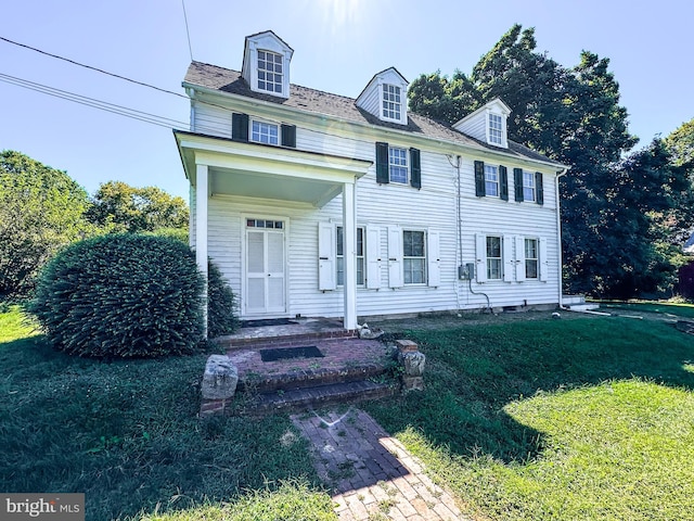 view of front of home with a front yard