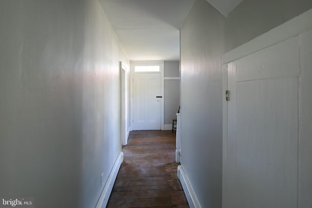 corridor with dark wood-type flooring